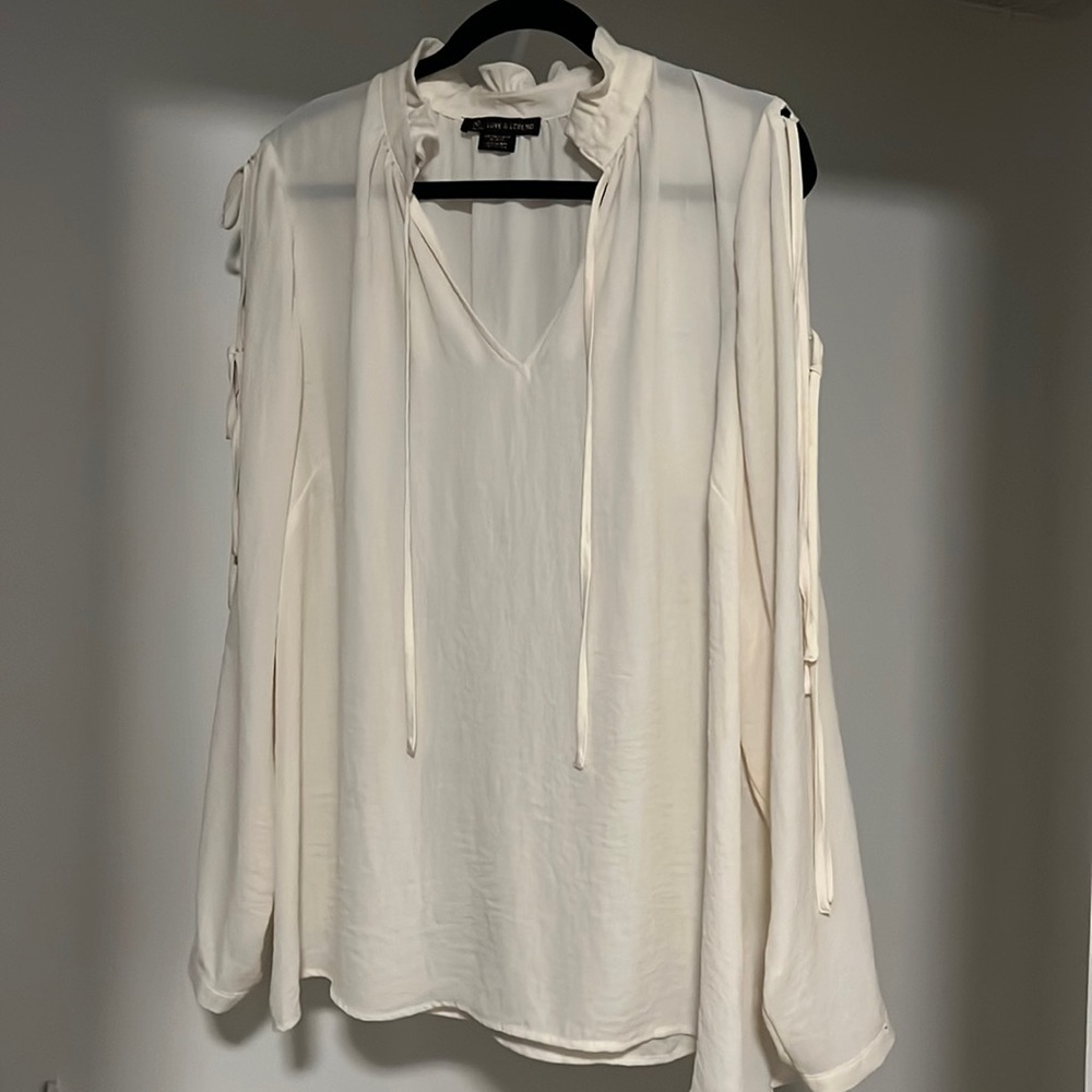 Nice cream blouse with open shoulders that you tie together